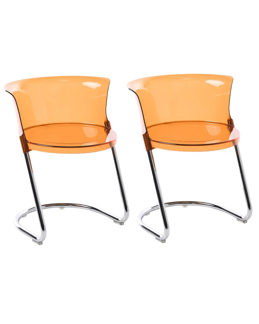 Two modern side chairs with translucent orange plastic seats and curved chrome metal legs, shown side-by-side on a plain white background.