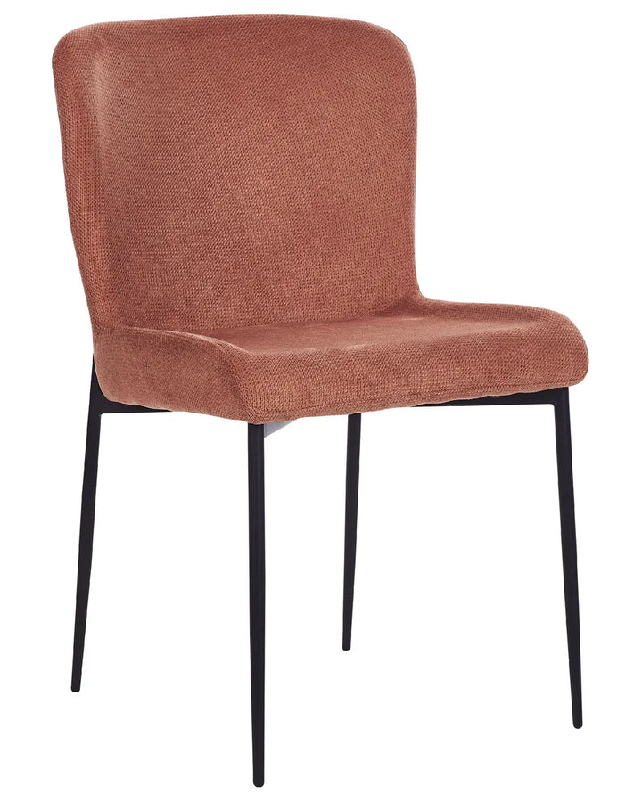 A modern dining chair with a textured terracotta fabric upholstered seat and backrest, supported by slim black metal legs, shown against a plain white background.
