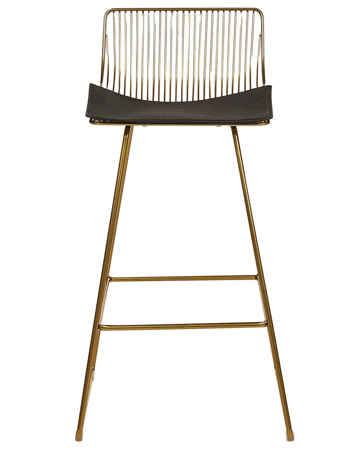 A modern bar stool with a gold metal frame, a thin vertical wire backrest, and a dark brown leather seat cushion, shown against a plain white background.
