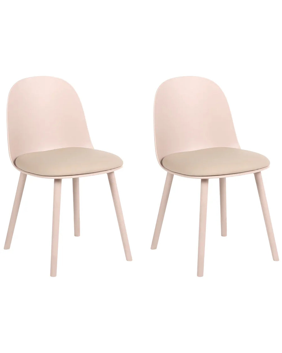 Two modern dining chairs with pale blush pink molded plastic seats and light beige upholstered cushions, shown on a plain white background.