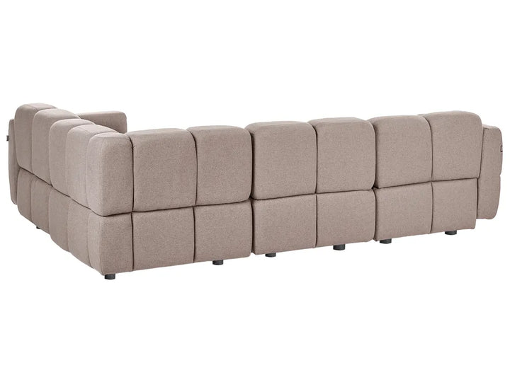 A modular L-shaped sectional sofa upholstered in a textured taupe fabric, featuring a grid of square tufted cushions, shown from a three-quarters angle on a white background.