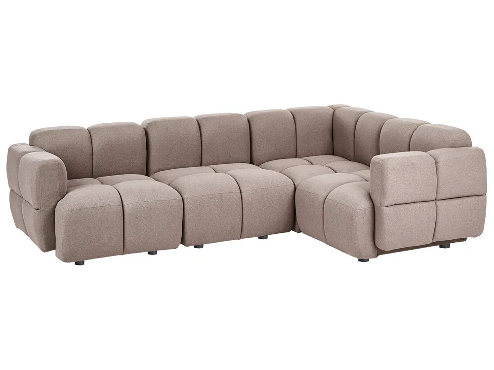 A modern modular sectional sofa upholstered in a textured taupe fabric, featuring a tufted grid pattern and blocky, padded arms, shown against a plain white background.