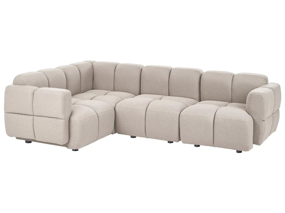 A modular sectional sofa upholstered in a textured taupe fabric, featuring a tufted grid pattern and blocky, modern armrests, shown against a plain white background.