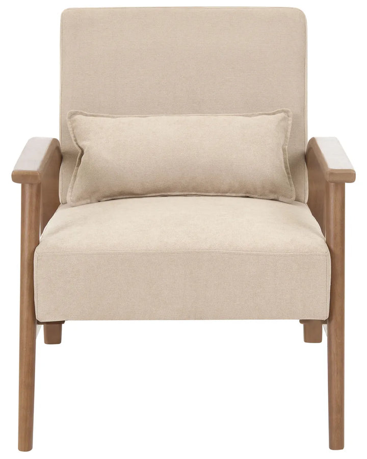 A modern armchair with beige textured fabric upholstery and a matching lumbar pillow, supported by a light brown wooden frame with tapered legs.