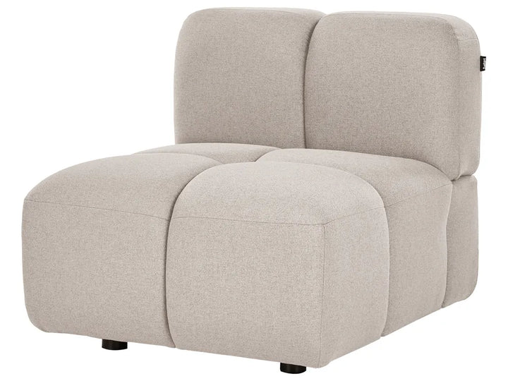 A modern modular lounge chair in a light beige textured fabric, featuring a low, chunky design with a two-seater backrest and dark round feet, shown on a plain white background.