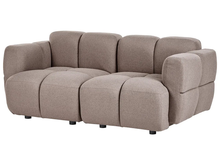 A modern modular upholstered sofa in a taupe-beige fabric, featuring a segmented, bubble-like design with low-profile arms and small black feet, shown against a plain white background.