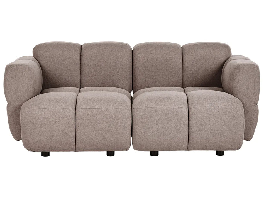 A modern two-seater sofa upholstered in a textured taupe fabric, featuring a unique segmented, blocky design with wide armrests and small black feet, shown against a plain white background.