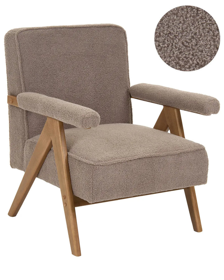 A mid-century modern accent chair with a textured taupe bouclé fabric upholstery and natural wood legs, featuring a circular fabric swatch inset in the upper right corner.