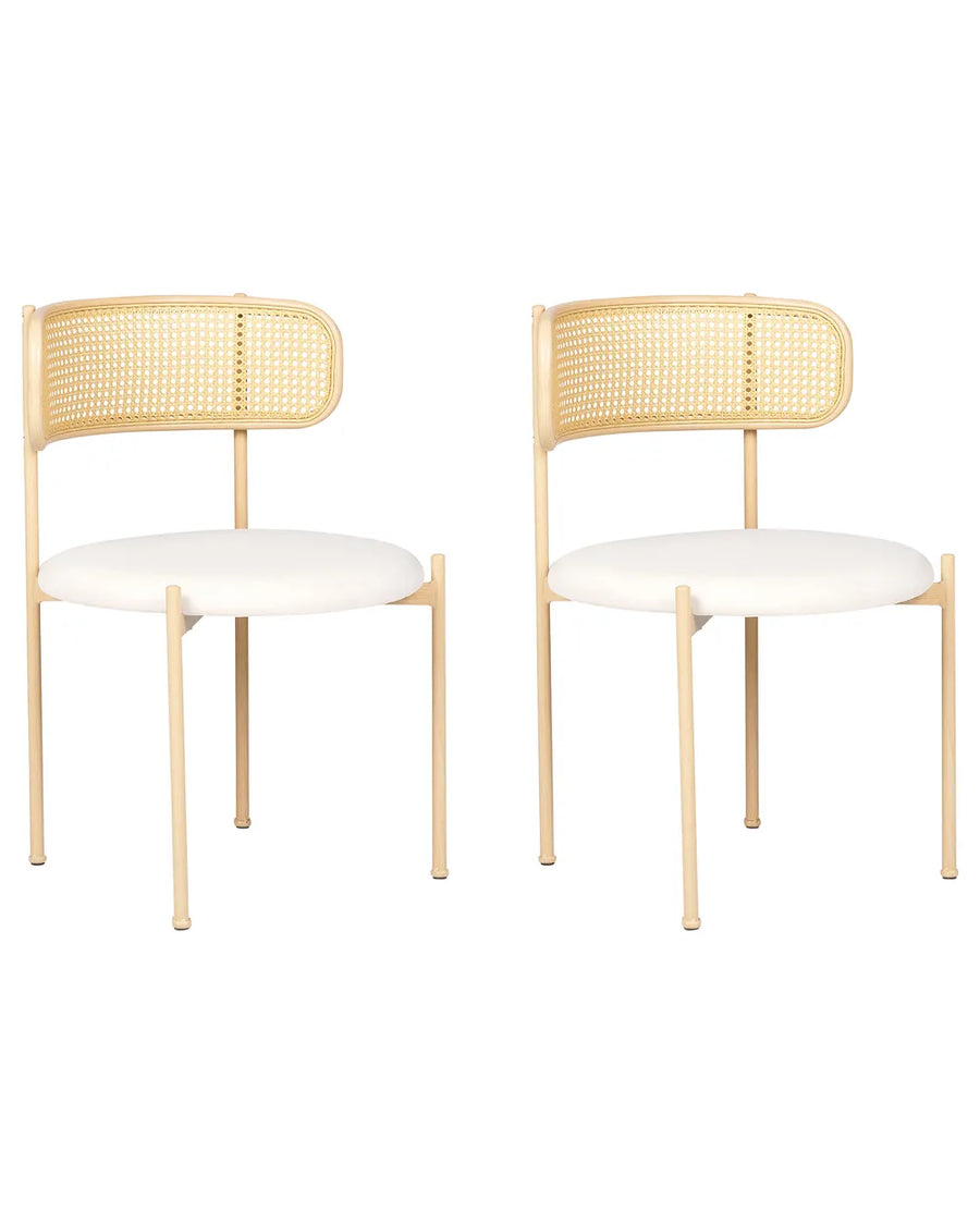 Two matching dining chairs with light natural wood frames, woven cane backrests, and off-white upholstered seats, shown on a plain white background.