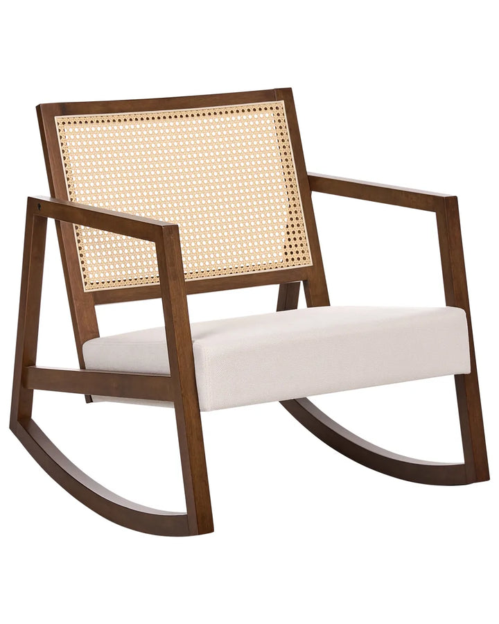 Wooden rocking chair with wicker backrest and white cushion on a white background