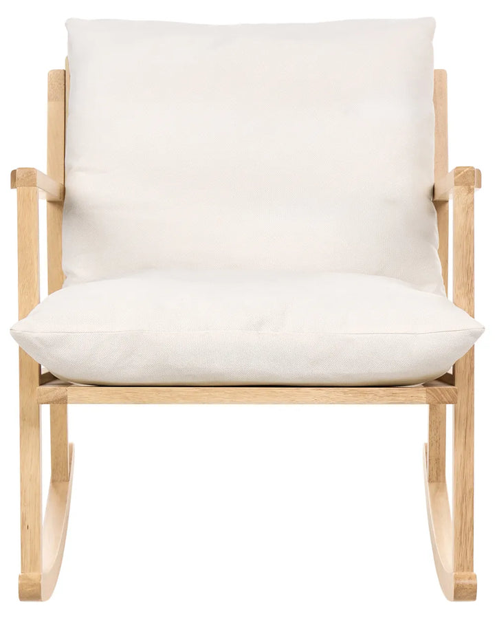 A light natural wood rocking chair with thick, plush off-white cushions on a solid white background.