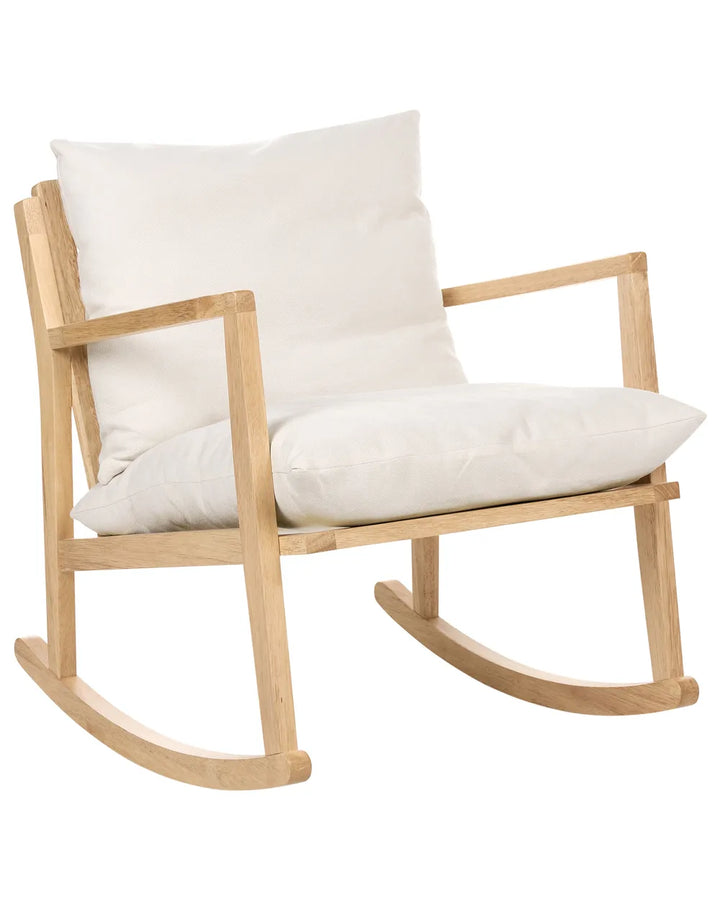Wooden rocking chair with white cushions on a white background