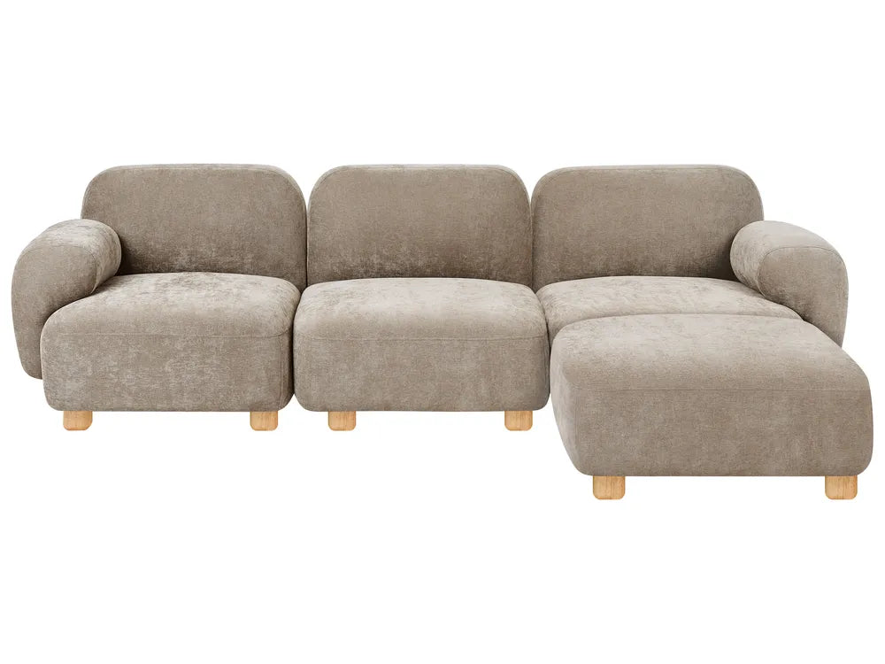 Three-seater beige sofa with footstool