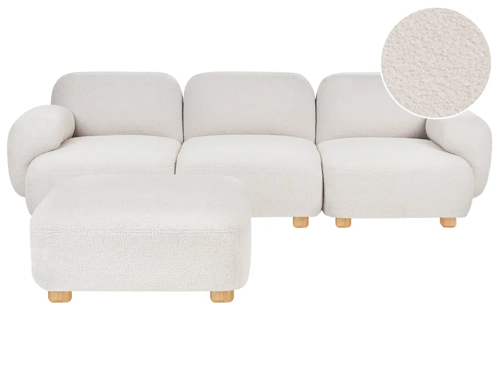 A modern three-seat sofa with a matching ottoman in a textured off-white bouclé fabric, shown on a plain white background with a circular fabric detail inset in the top right.