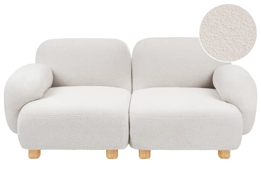 A modern two-seater sofa upholstered in a textured bouclé fabric, shown on a plain white background with a circular fabric close-up inset in the top right.