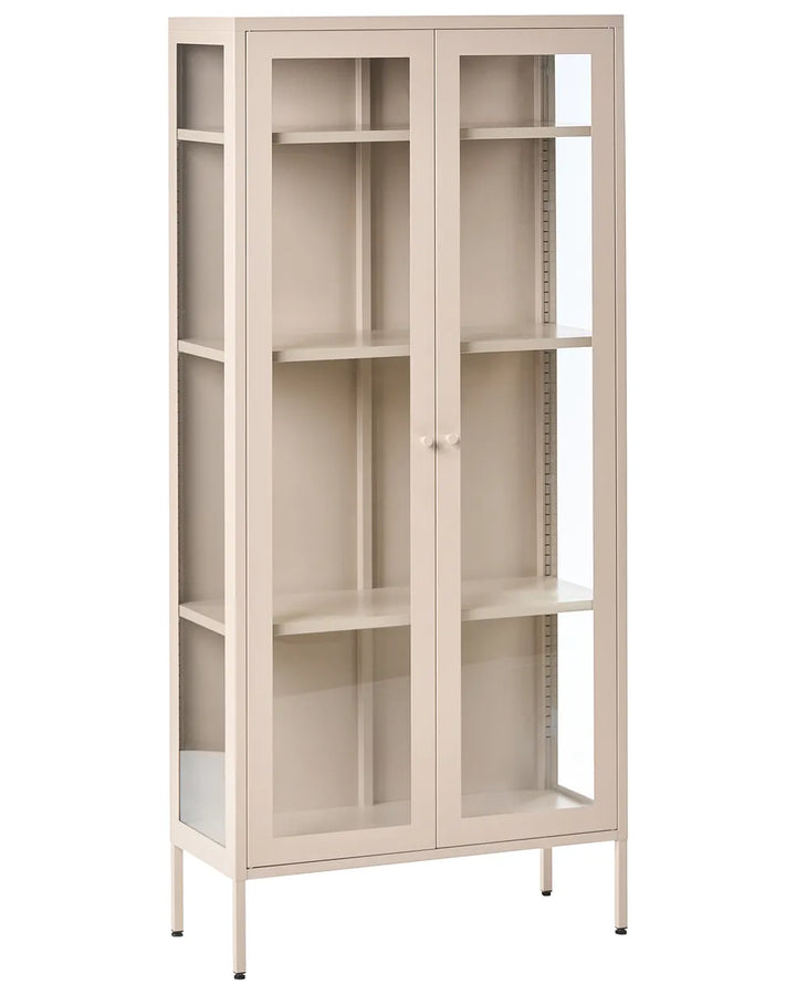 A tall, narrow beige storage cabinet with two glass doors, multiple interior shelves, and slim metal legs, shown on a plain white background.