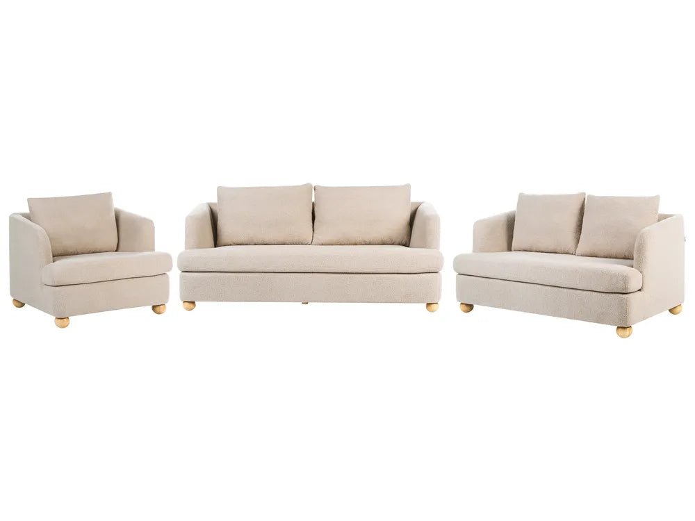 A three-piece beige upholstered furniture set on a white background, including an armchair, a loveseat, and a sofa with small gold-toned legs.