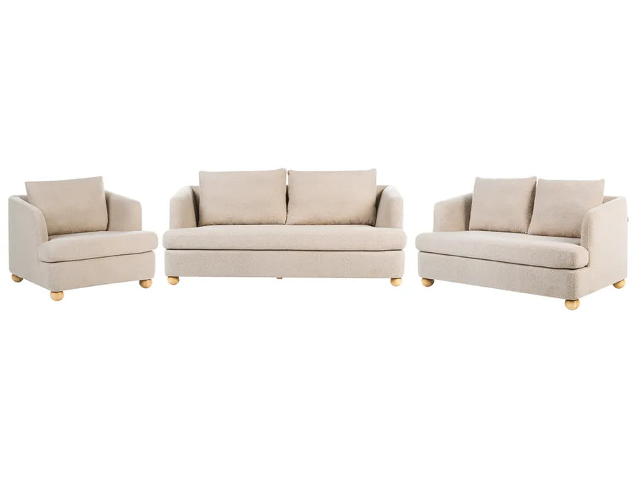 A three-piece beige upholstered furniture set on a white background, including an armchair, a loveseat, and a sofa with small gold-toned legs.