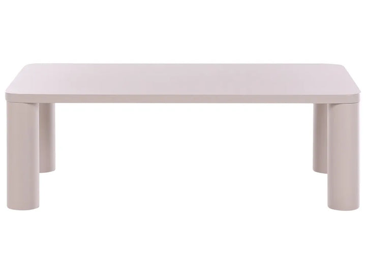 A minimalist rectangular low table with a light beige top and matching cylindrical legs, shown against a plain white background.