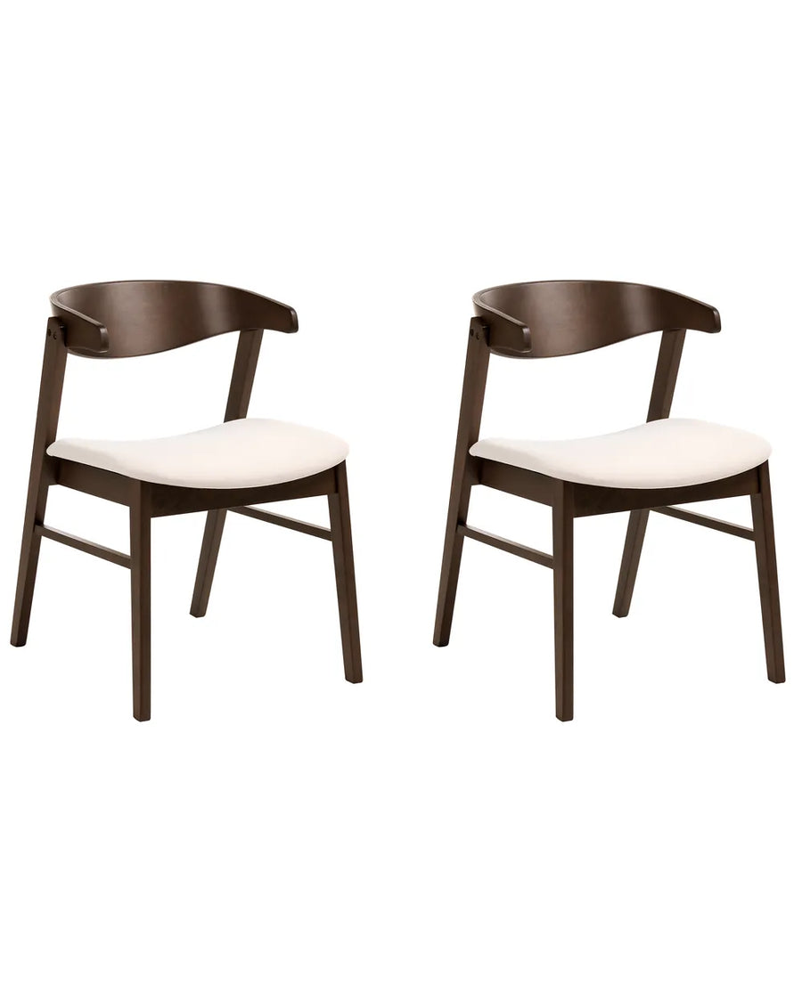 Two wooden chairs with white cushions on a white background