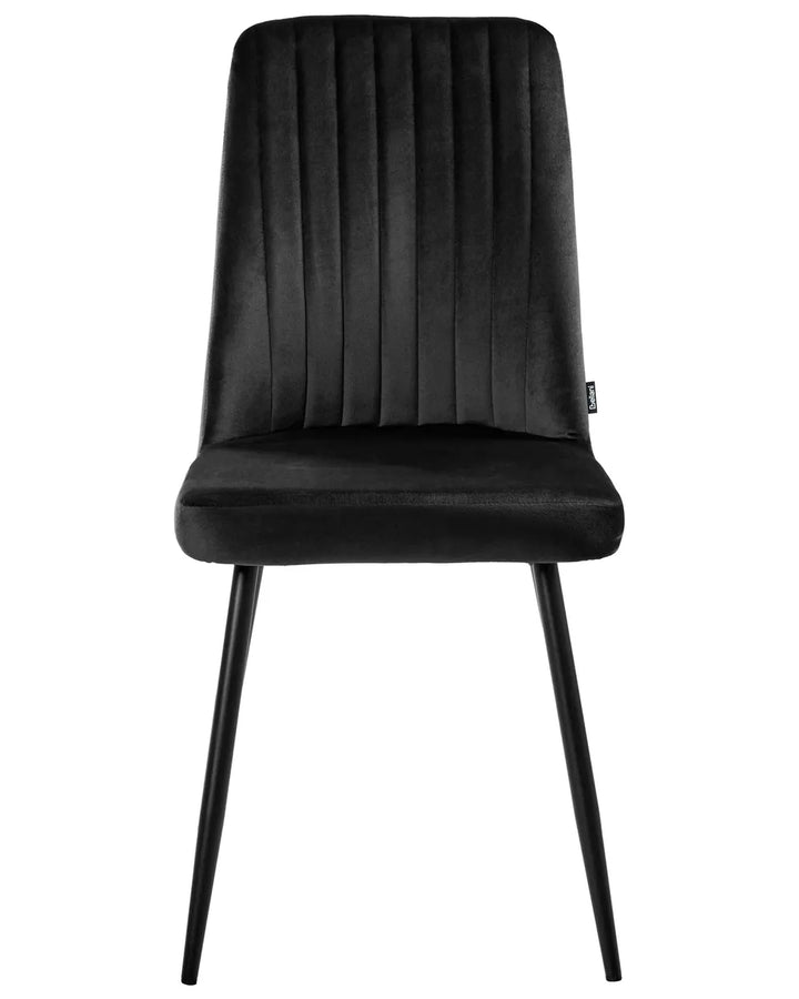 A black upholstered dining chair with a vertically channel-tufted backrest and slim tapered legs, shown against a plain white background.
