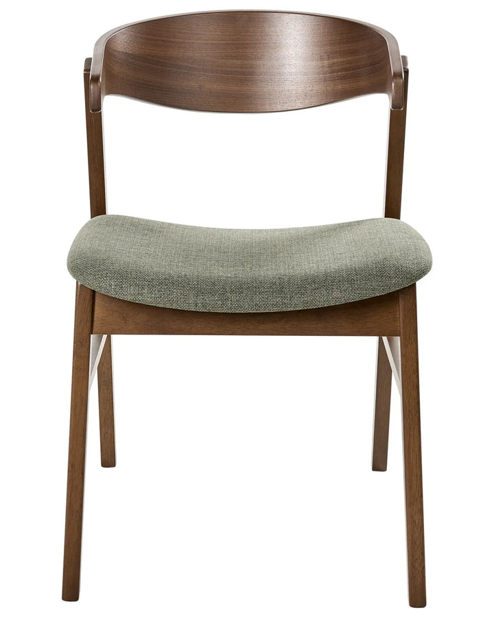 Wooden chair with a green cushion on a white background