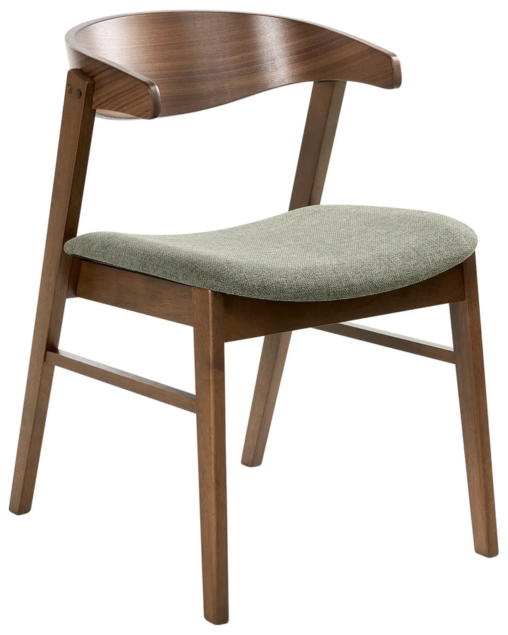 Wooden chair with a green cushion on a white background