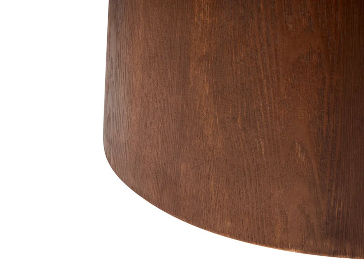 Close-up of a curved wooden surface with a warm medium-brown wood grain texture against a plain white background.