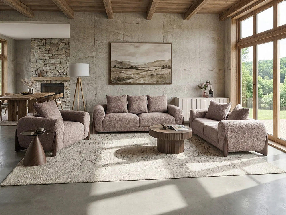 Modern living room with brown sofas, coffee table, and large windows.