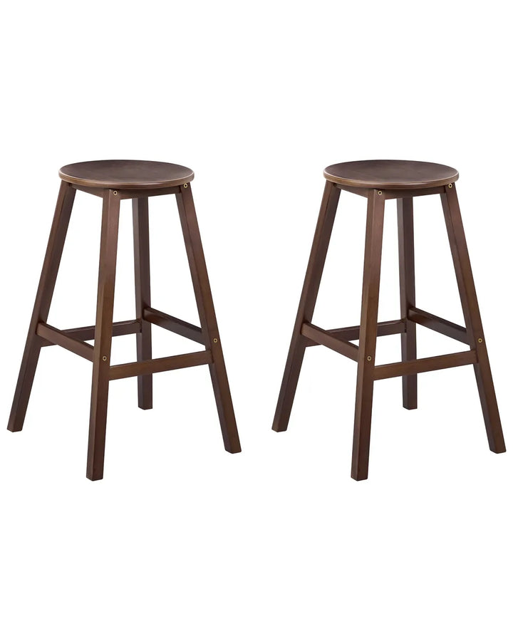 Two wooden bar stools on a white background