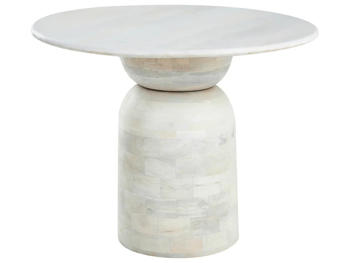 White marble side table with a round top and cylindrical base on a white background