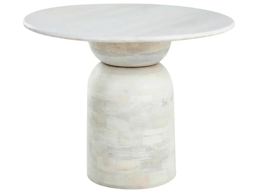 White marble side table with a round top and cylindrical base on a white background