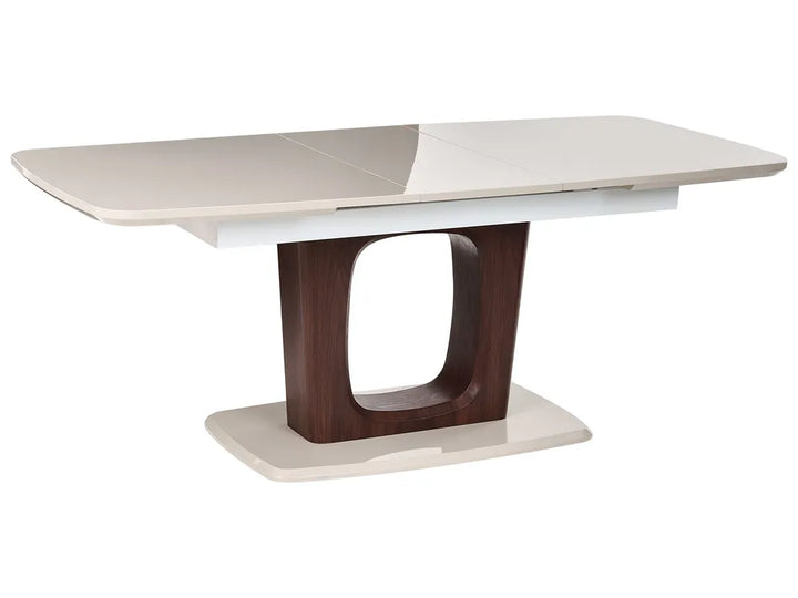 Dining table with a white ceramic top and wooden base on a white background