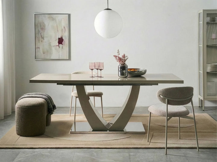 Modern dining room with a stylish table and chairs.