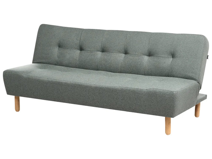 A modern gray fabric futon sofa with a tufted backrest and light wood legs, shown on a plain white background.