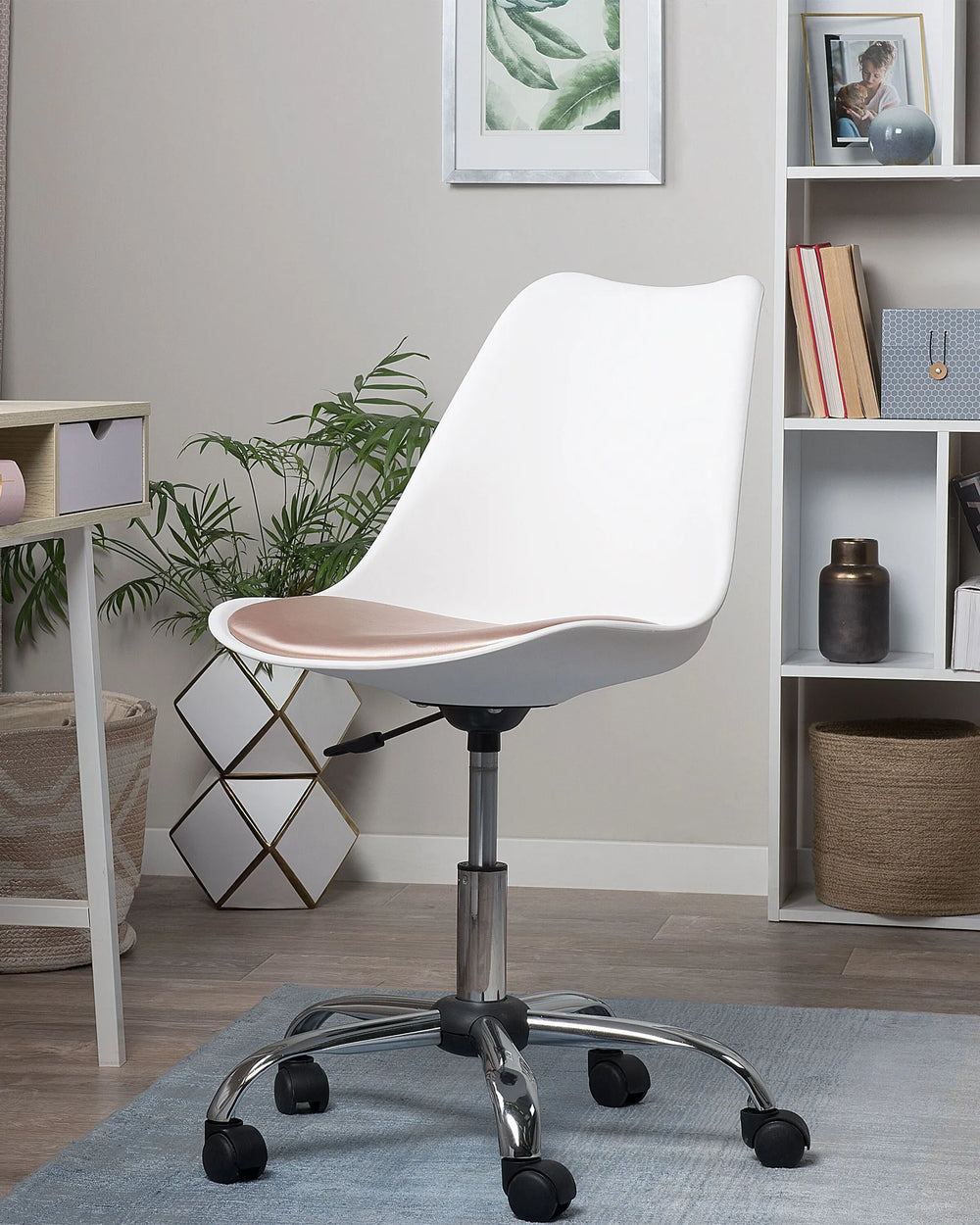 White office chair with a brown seat in a room with shelves and plants.