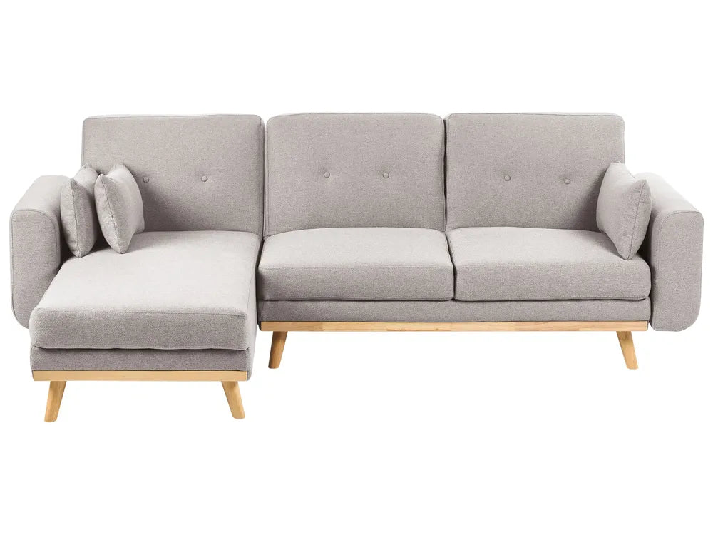 A modern three-seat sofa with a left-side chaise lounge, upholstered in light gray fabric with a natural wood frame and legs, shown against a plain white background.
