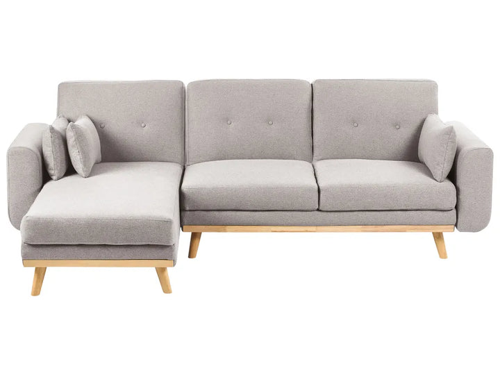 A modern three-seat sofa with a left-side chaise lounge, upholstered in light gray fabric with a natural wood frame and legs, shown against a plain white background.