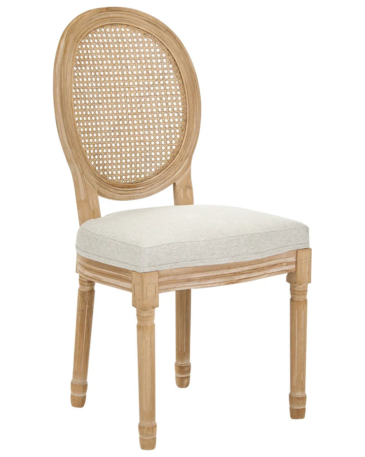 A classic-style dining chair with a light natural wood frame, a woven cane backrest, and a light beige upholstered seat cushion, shown against a plain white background.