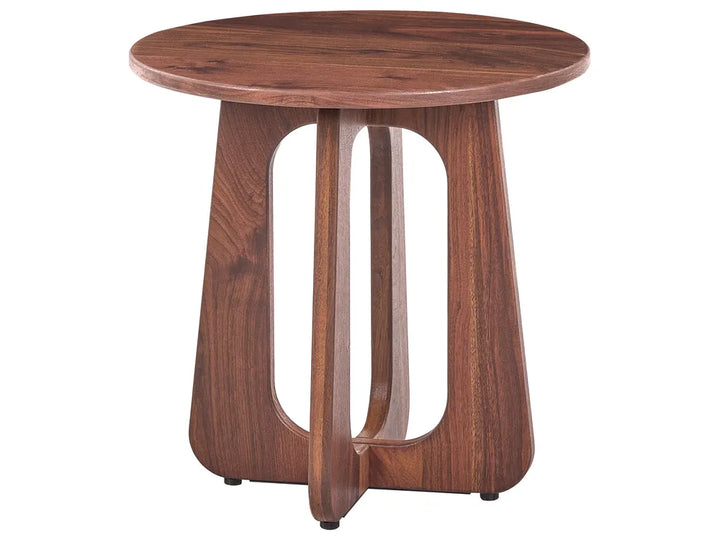A round wooden side table with a medium brown walnut finish, featuring a sculptural three-legged base with open center panels, shown on a plain white background.