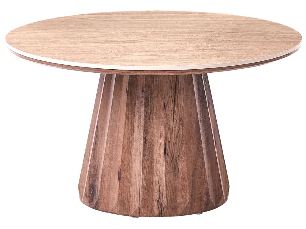 A round dining table with a light natural wood top and a sculptural, fluted pedestal base made of medium brown wood, shown on a solid white background.