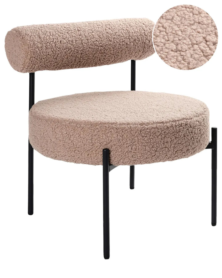 A modern low-profile lounge chair upholstered in a textured bouclé fabric, featuring a circular seat, a curved cylindrical backrest, and slim black metal legs. A circular inset in the top right shows a close-up of the bouclé texture.