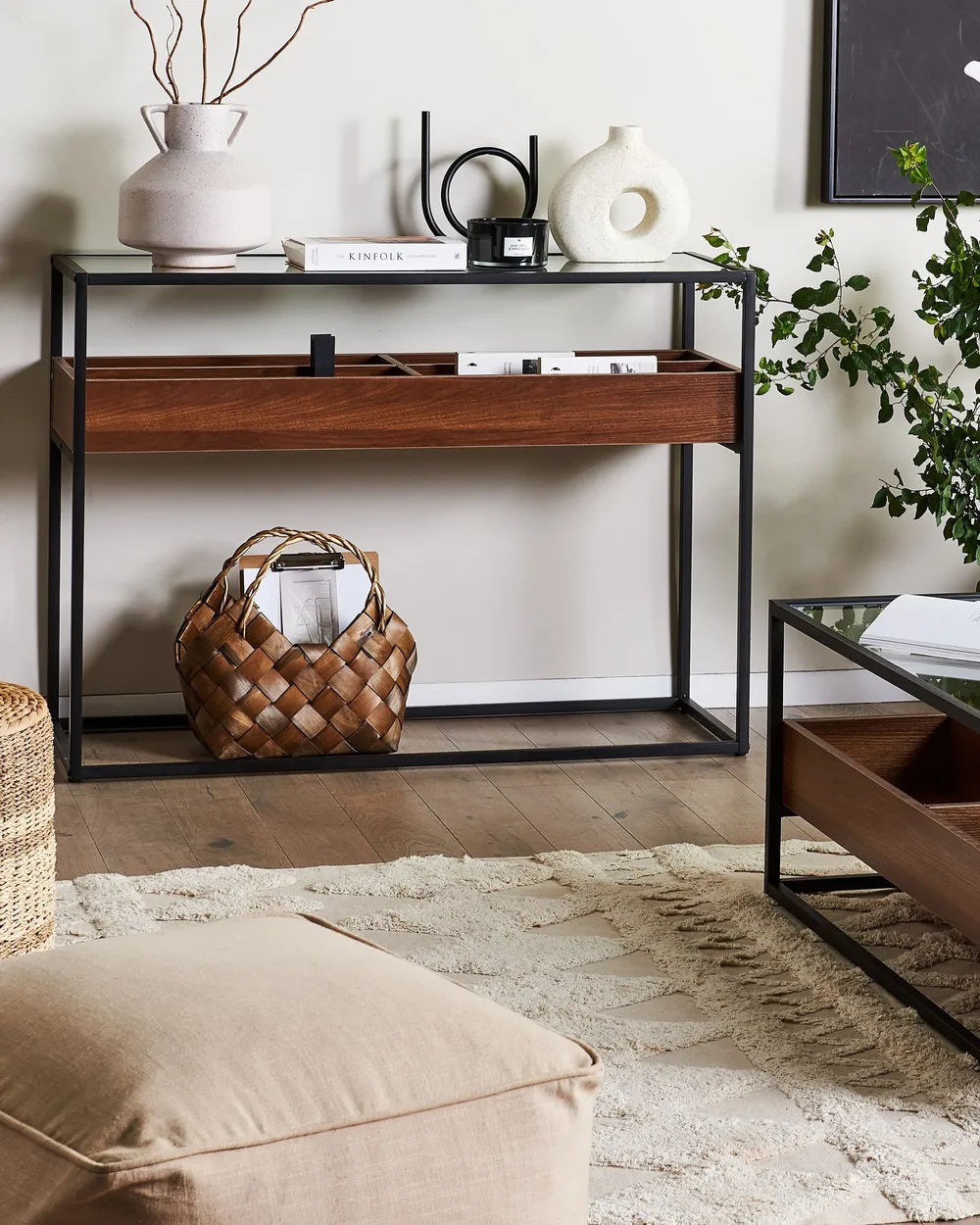 Dark wood console table with black frame