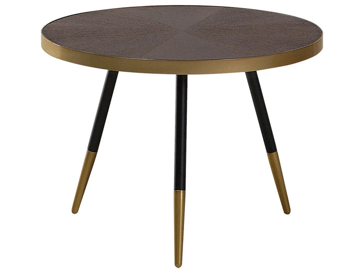 Round table with a dark brown top and black legs with gold accents on a white background