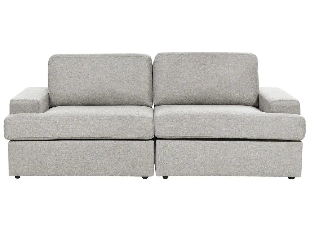 A light gray upholstered two-seat sofa with a low-profile design, wide armrests, and a lift-up base, shown against a plain white background.