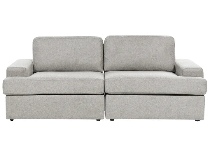 A light gray upholstered two-seat sofa with a low-profile design, wide armrests, and a lift-up base, shown against a plain white background.