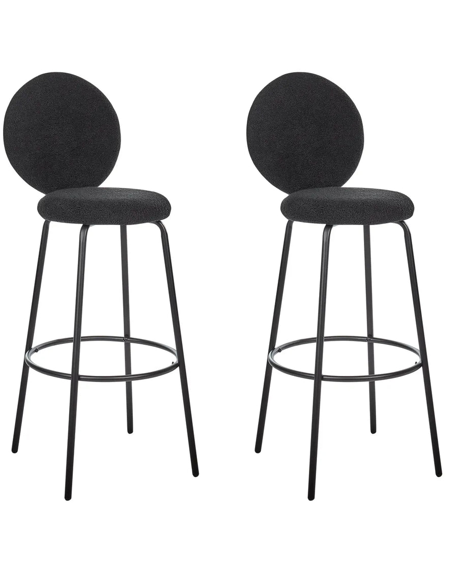 Two green bar stools with black metal legs on a white background