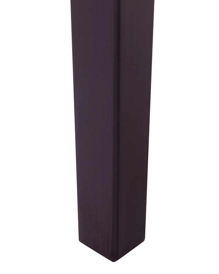 A close-up of a dark brown wooden post or column showing its corner joint and wood grain texture against a plain white background.