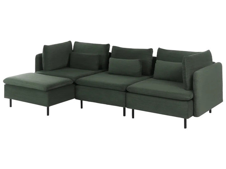 A modern sectional sofa in dark forest green textured fabric, featuring a left-facing chaise ottoman, multiple back cushions, and slim black legs, shown against a plain white background.