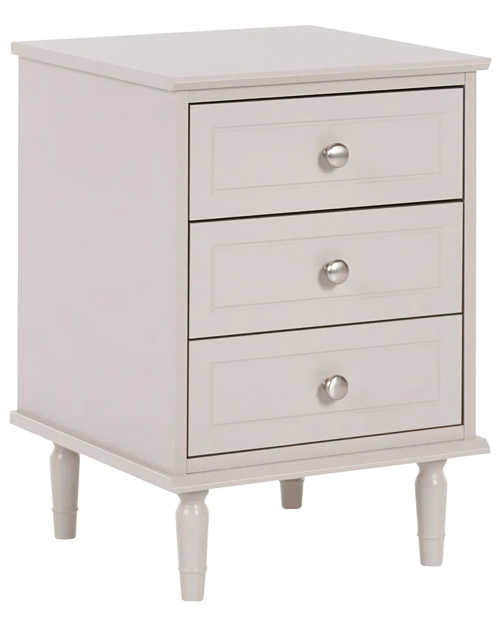 A three-drawer nightstand with a light beige finish and silver round knobs, shown on a plain white background.